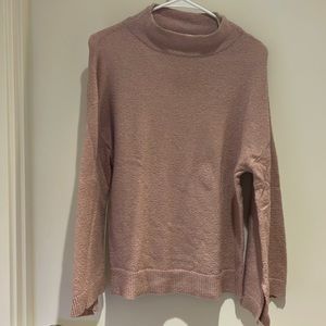 Mauve mockneck sweater with wide sleeves
